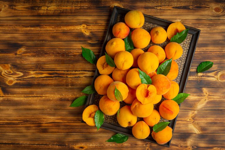 peaches are placed wooden board