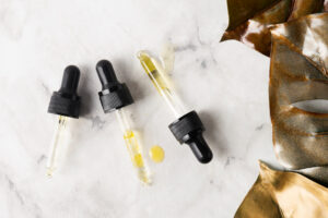 flat lay different pipettes marble background