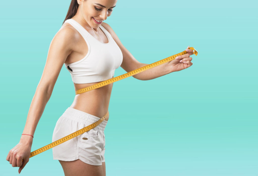 weight loss concept woman with measuring tape