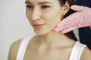 woman with doctor cosmetology studio