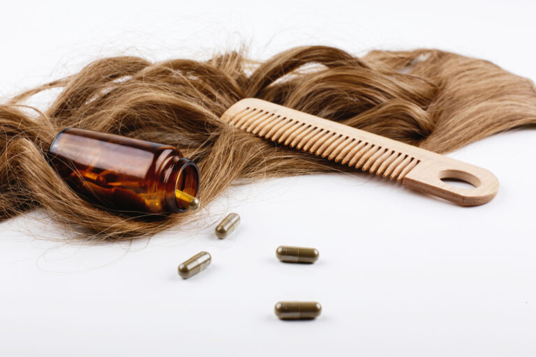 wooden hair comb bottle with vitamins lie brown hair curls