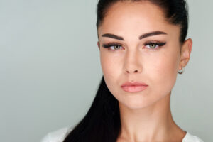 young woman with artificial eyelash loss problem fallen eyelashes all face needs eyelash